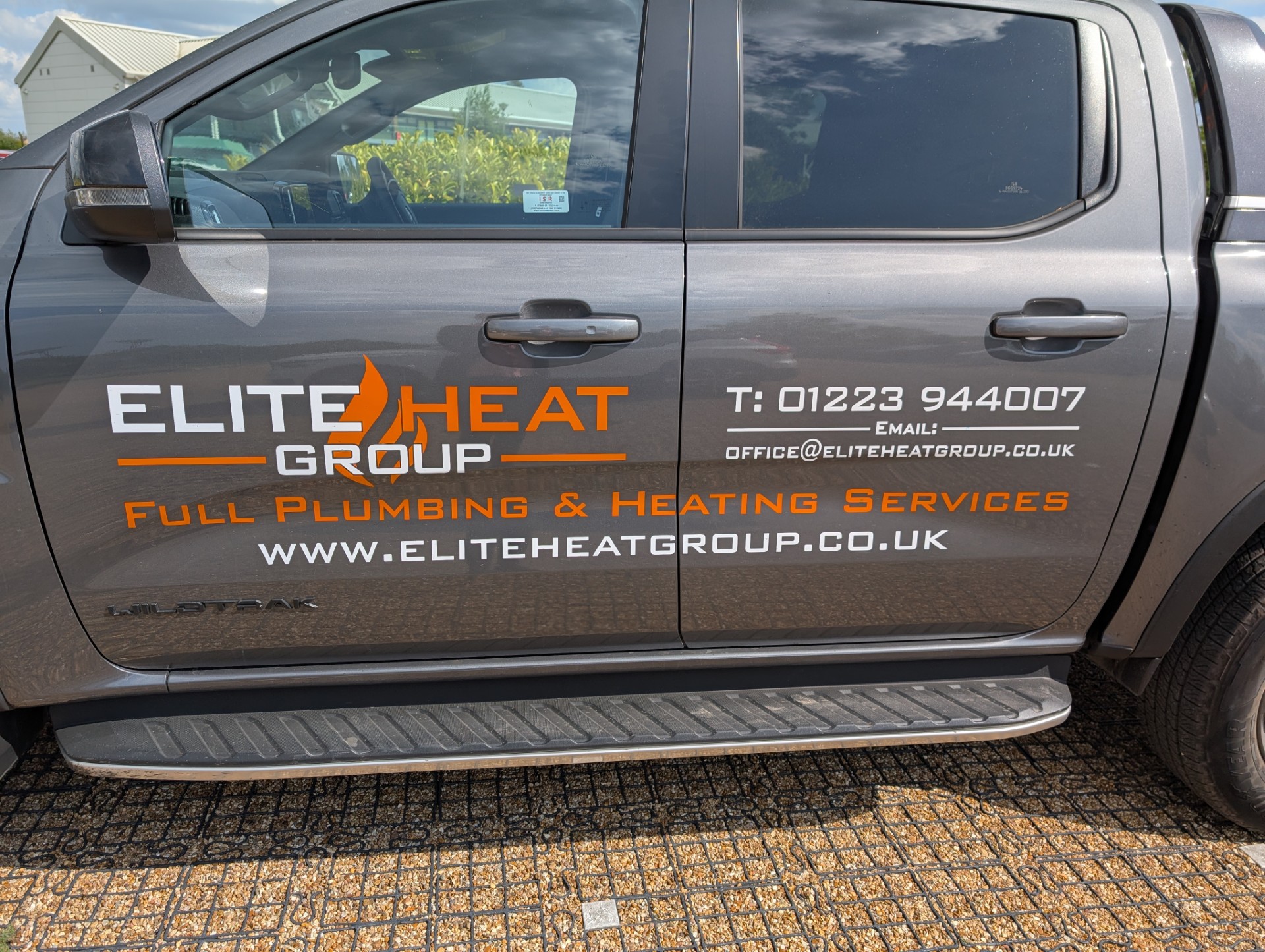 van signage darker grey 2 About Us